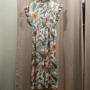 New floral jumpsuit. Size is Medium